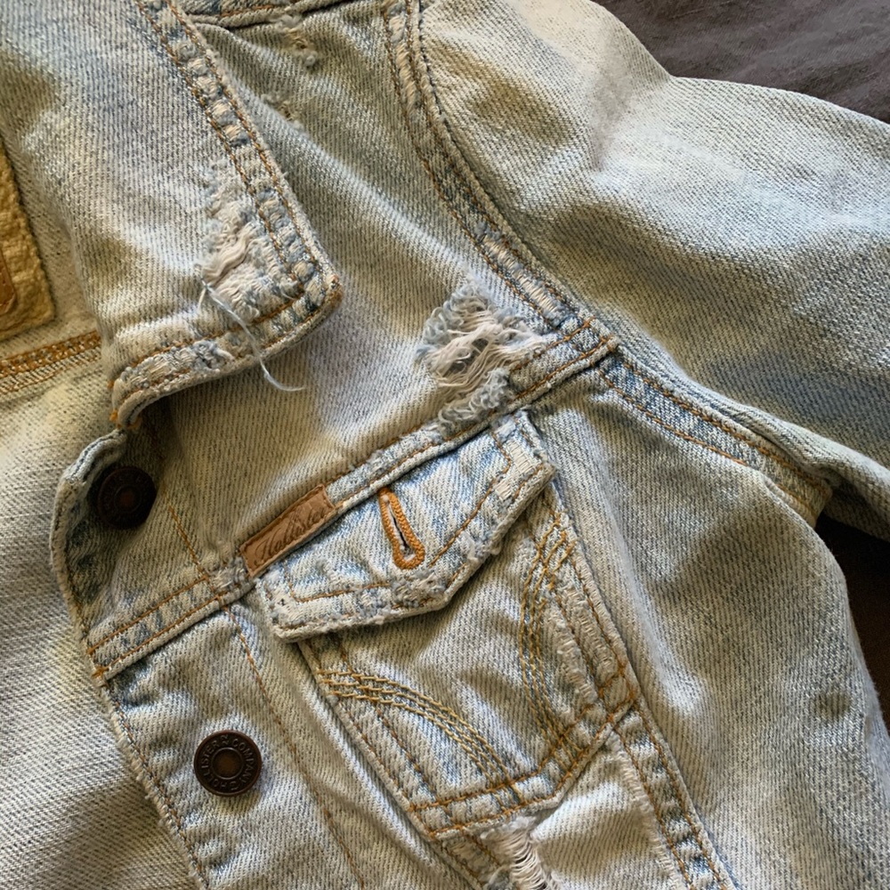 Cropped and distressed denim hollister jacket